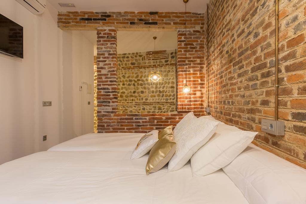 Albany Ancha Hotel León Buitenkant foto A bedroom at the hotel