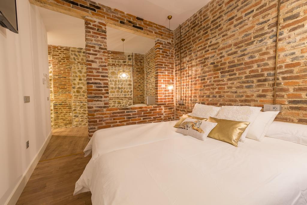 Albany Ancha Hotel León Buitenkant foto A bedroom at the hotel